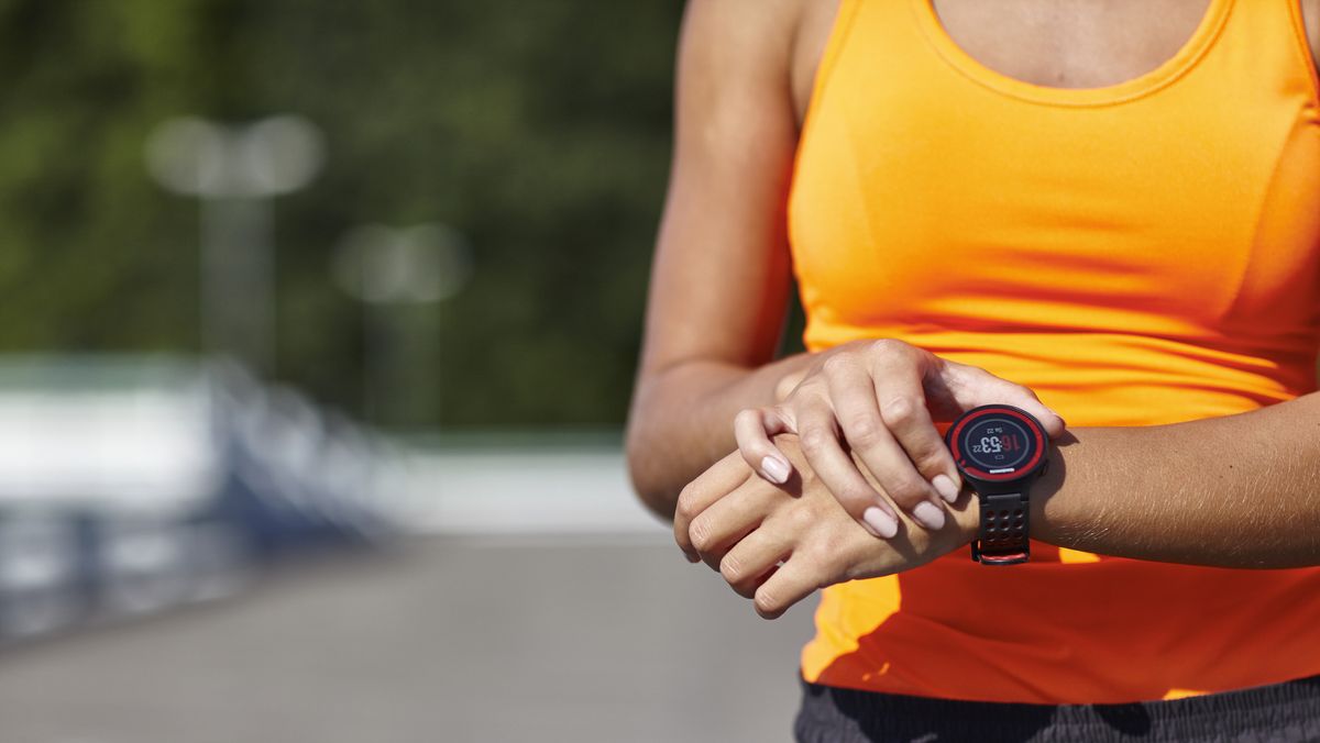 cropped-shot-of-young-female-runner-setting-royalty-free-image-1621264495_